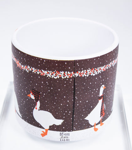Planter with snow and geese design